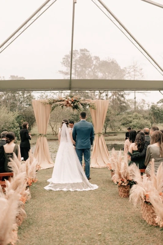 Wedding guests sharing photos at reception